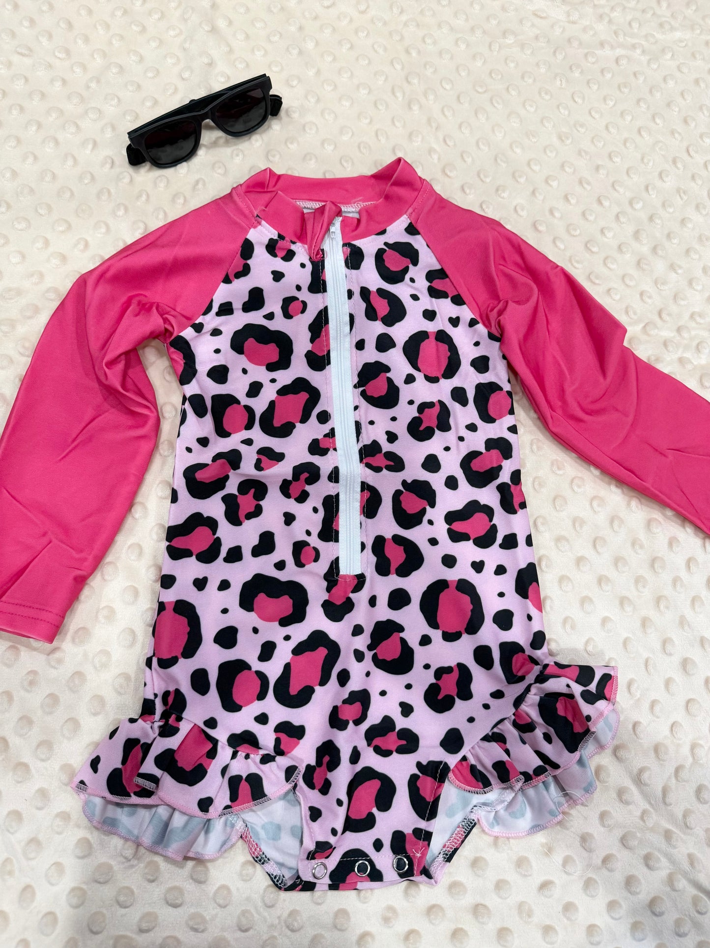 Pink cheetah swim