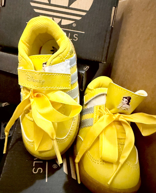 Yellow tennis shoes